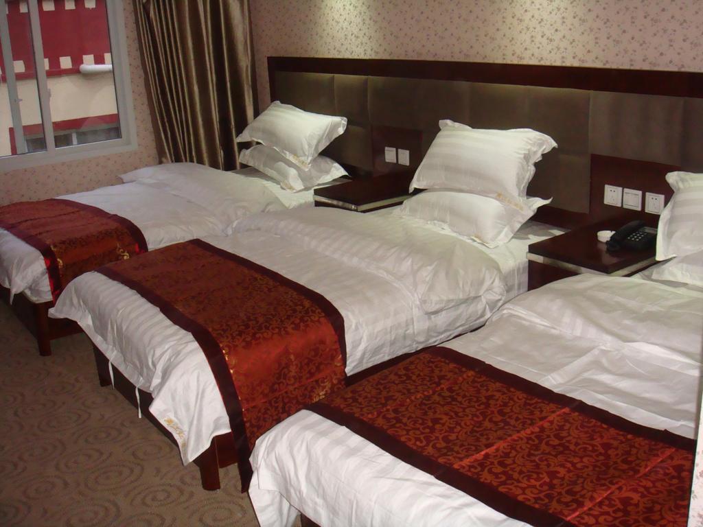 Jiuzhaigou Man Jiang Hong Hotel Quarto foto